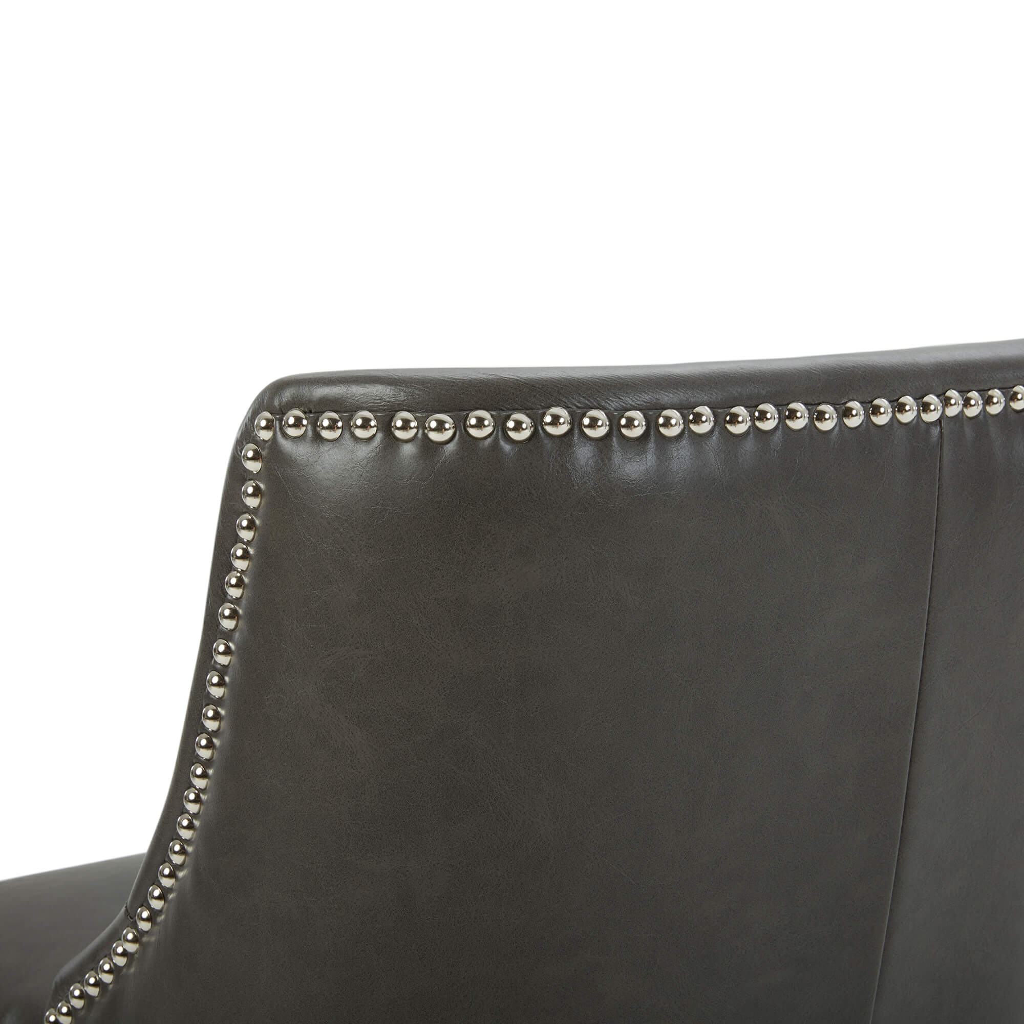 Close-up of Asher swivel stool back with silver nailhead trim on dark gray upholstery - CHITA Living