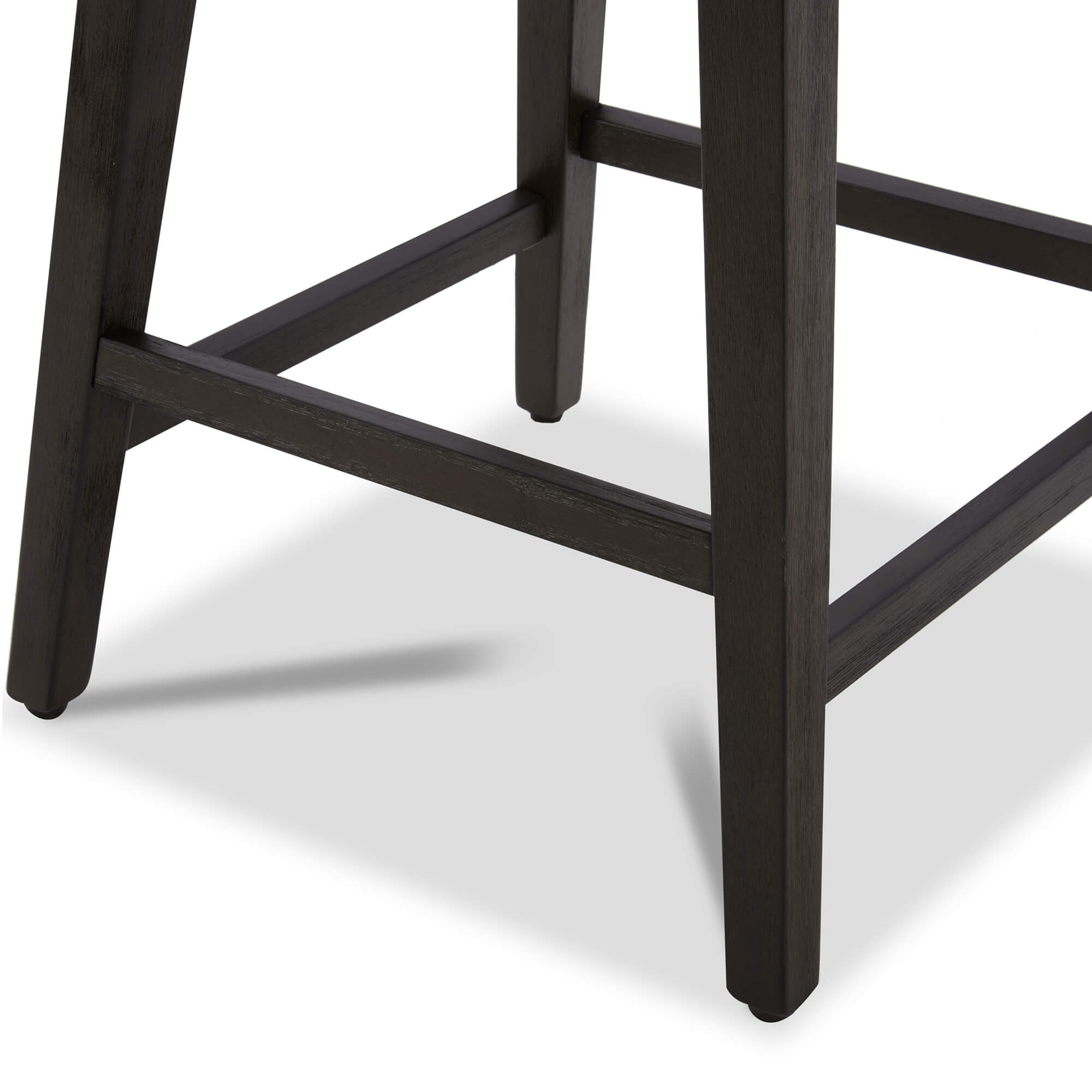 Close-up of sturdy wooden legs of Asher swivel stool with footrest support - CHITA Living