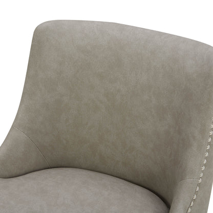 Close-up of Asher swivel stool in light gray upholstery with silver nailhead trim - CHITA Living