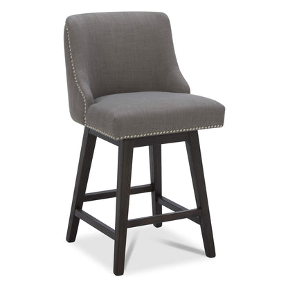 Asher swivel bar stool in gray fabric with silver nailhead trim and dark wooden legs - CHITA Living