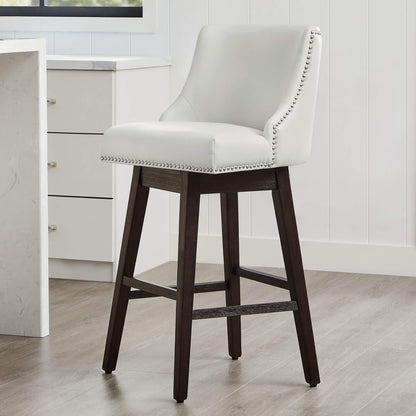 White Asher swivel bar stool with nailhead trim in sleek modern kitchen - CHITA Living