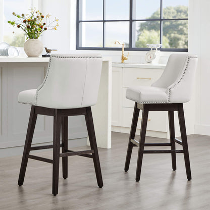 Asher swivel bar stools in white upholstery with nailhead trim in contemporary kitchen - CHITA Living