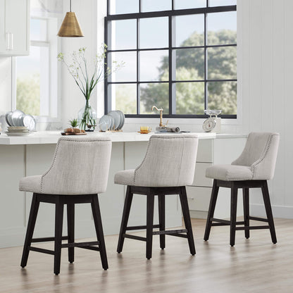 Asher swivel bar stools in light gray upholstery with silver nailhead trim in modern kitchen - CHITA Living