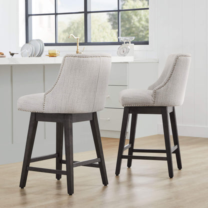 Asher swivel bar stools with nailhead trim in a contemporary kitchen - CHITA Living