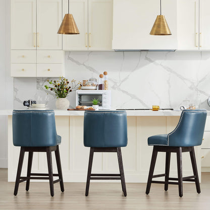 Teal Asher swivel bar stools with nailhead trim at a modern kitchen island - CHITA Living