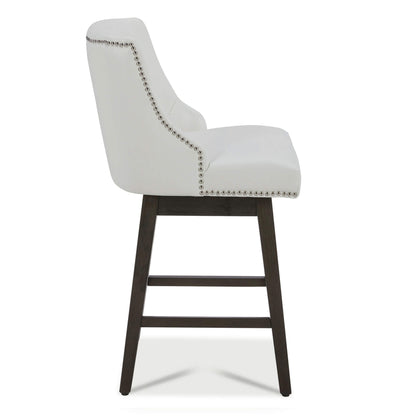 Side view of white Asher swivel bar stool with silver nailhead trim and dark legs - CHITA Living