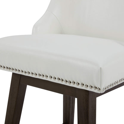 Close-up of white Asher swivel bar stool with silver nailhead trim on dark wood legs - CHITA Living