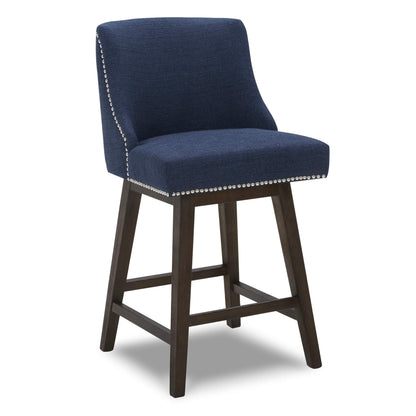 Navy Asher swivel bar stool with silver nailhead trim and dark wooden legs - CHITA Living