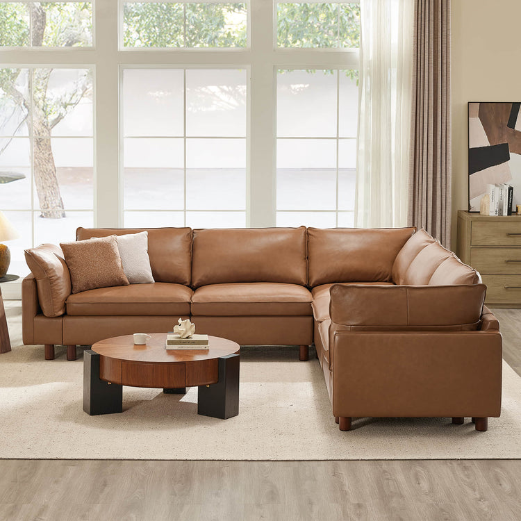 Brown leather Brendon modular sectional sofa with wood legs and plush cushions.