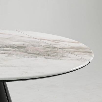Camila round extendable dining table with glossy white sintered stone top and marble veining