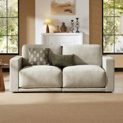 Sophisticated and cozy sofa perfect for a chic living room.