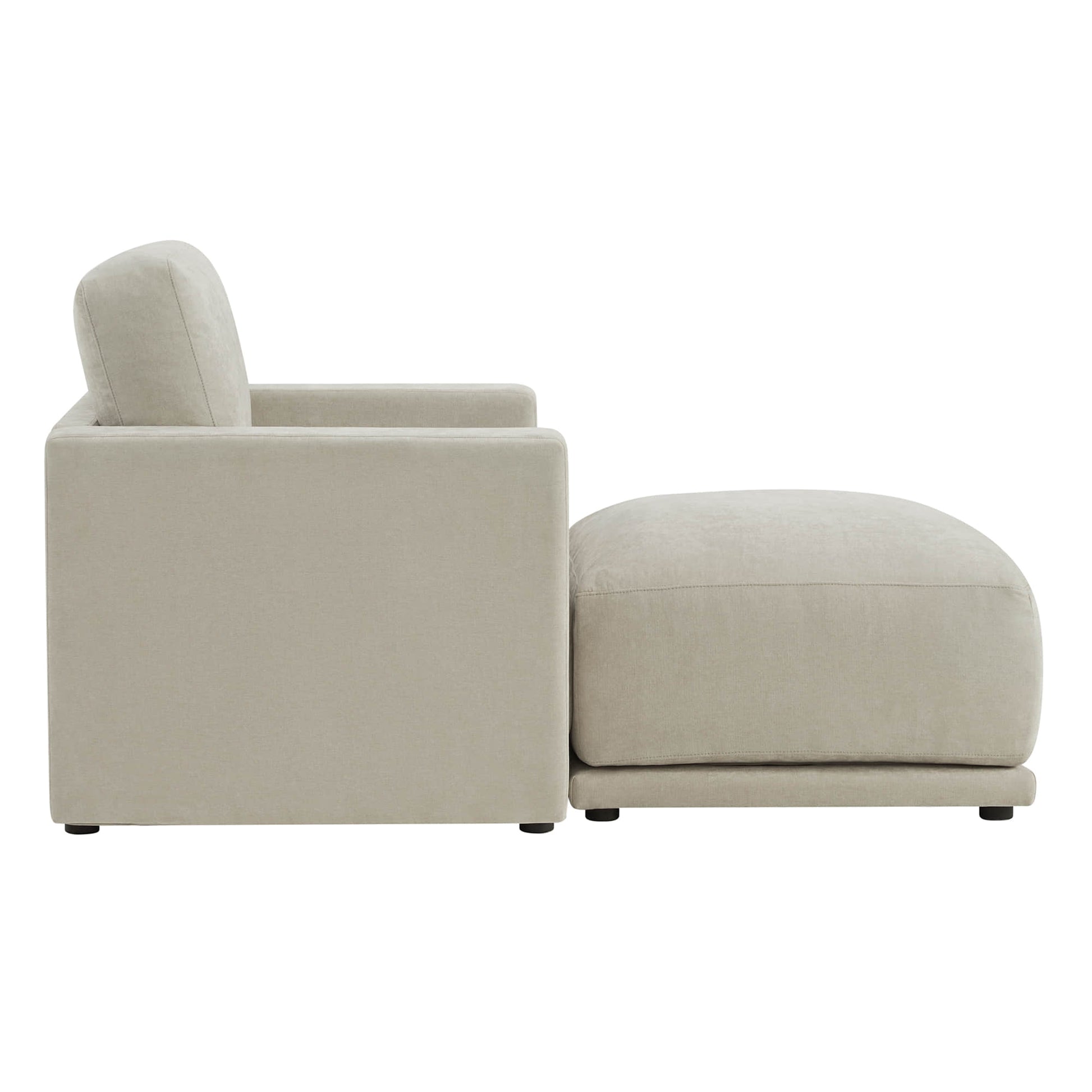 Side view of a beige modular chaise sectional sofa with a durable fabric design.