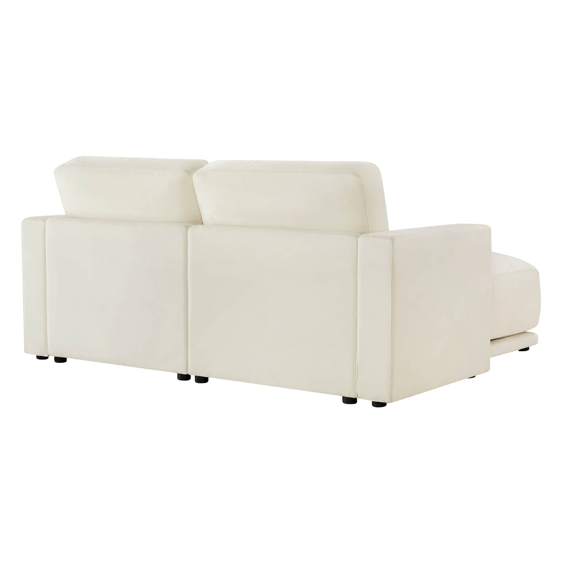 Rear view of modular sectional sofa with chaise, upholstered in durable fabric.