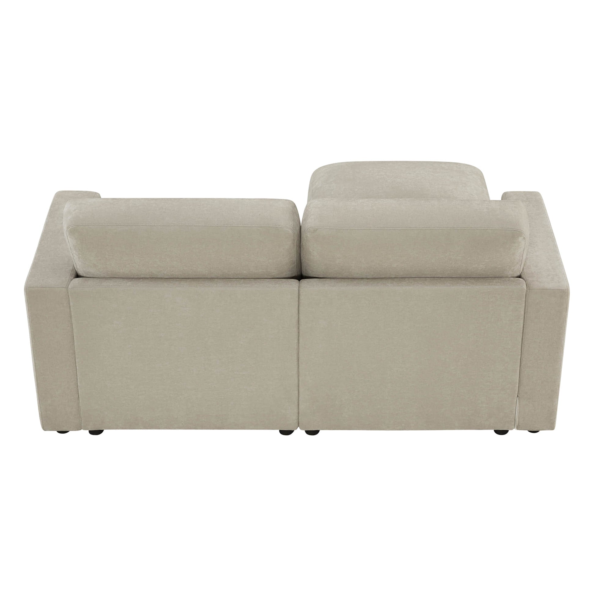 Back view of a beige sectional sofa.