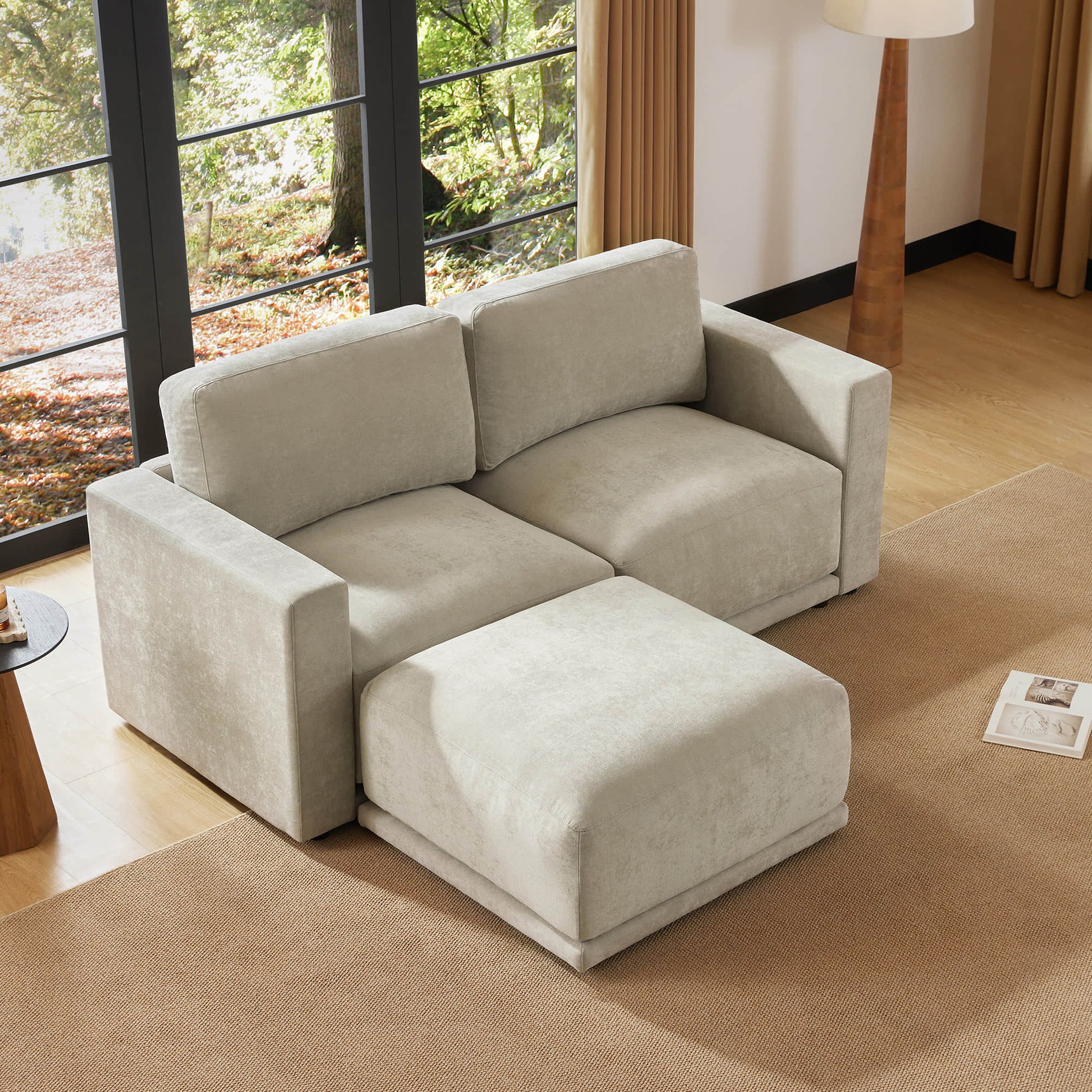 Durable modular sofa sectional with chaise in a cozy setting.