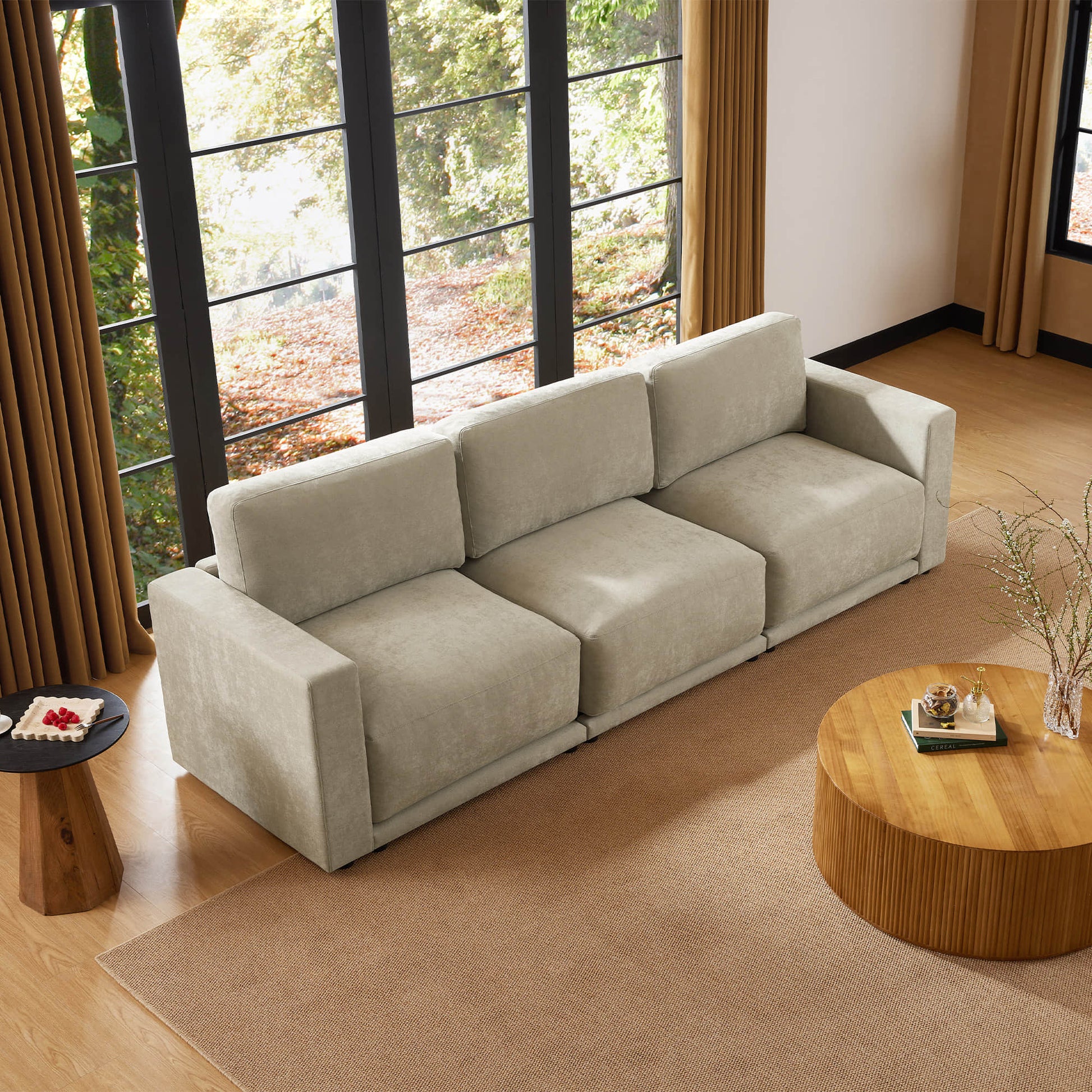 Elegant chaise sectional with a view of nature.