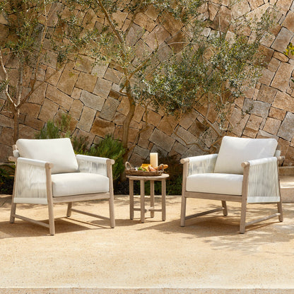 Sienna Modern Acacia Wood Woven Outdoor Bistro Set with two chairs and a small table in a sunny patio.