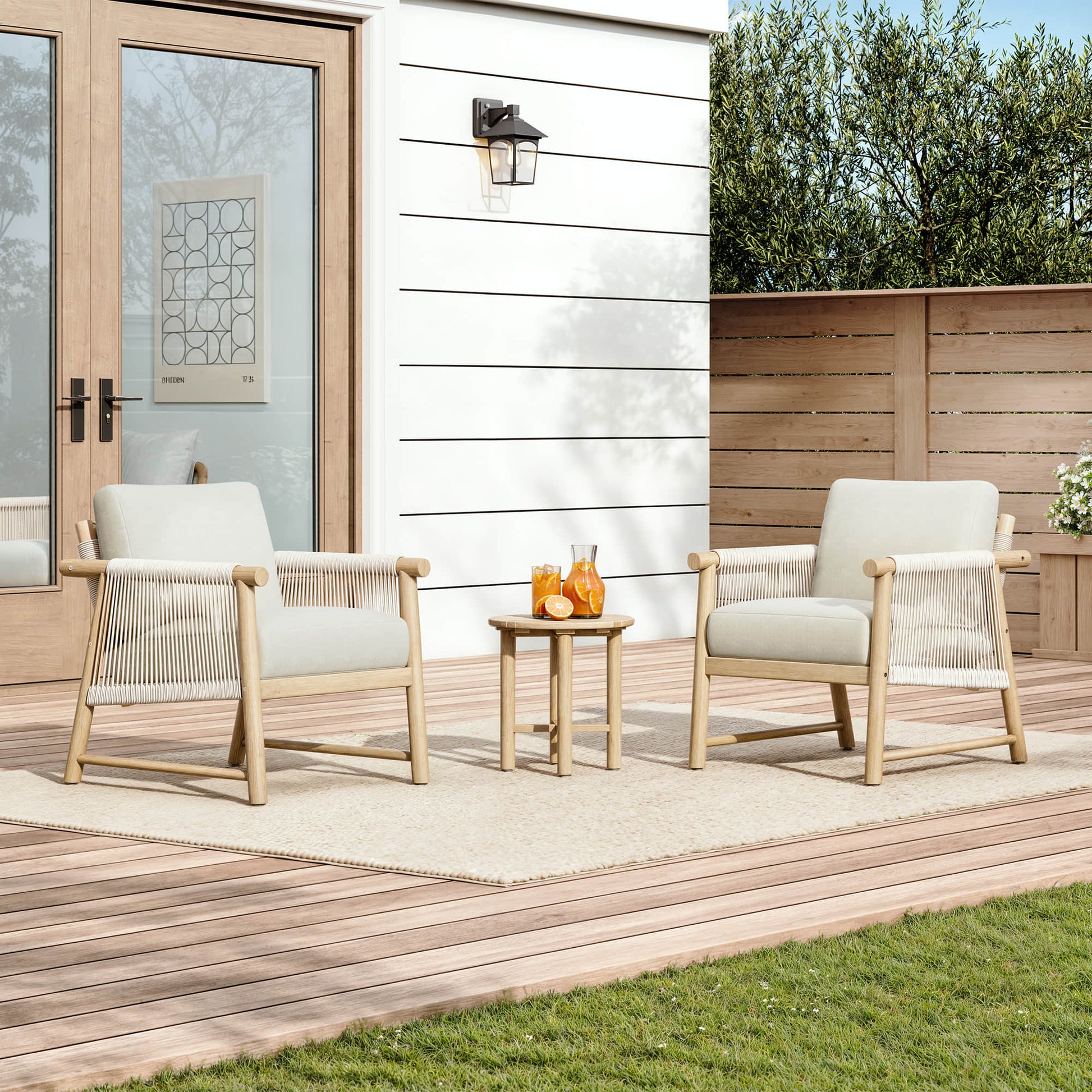 Sienna Modern Acacia Wood Woven Outdoor Bistro Set with two chairs and a small table on a sunny patio.