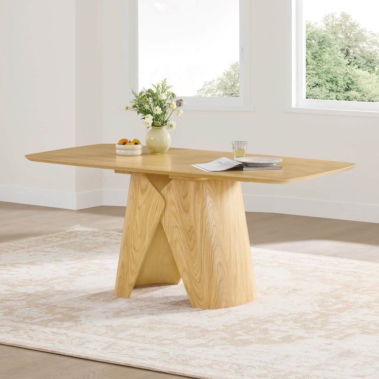Elowen sculptural wood base dining table with unique geometric pedestal in oak finish.