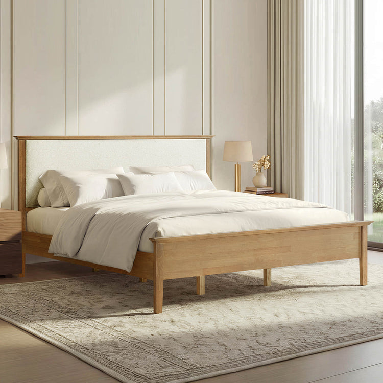 Ezra Mid-Century Boucle Platform Bed: Natural wood frame, textured cream headboard.