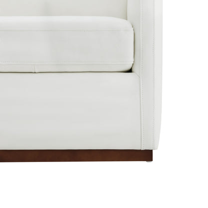 Detail of Henry Modern Swivel Accent Chair's plush white leather cushion with wooden base - CHITA Living