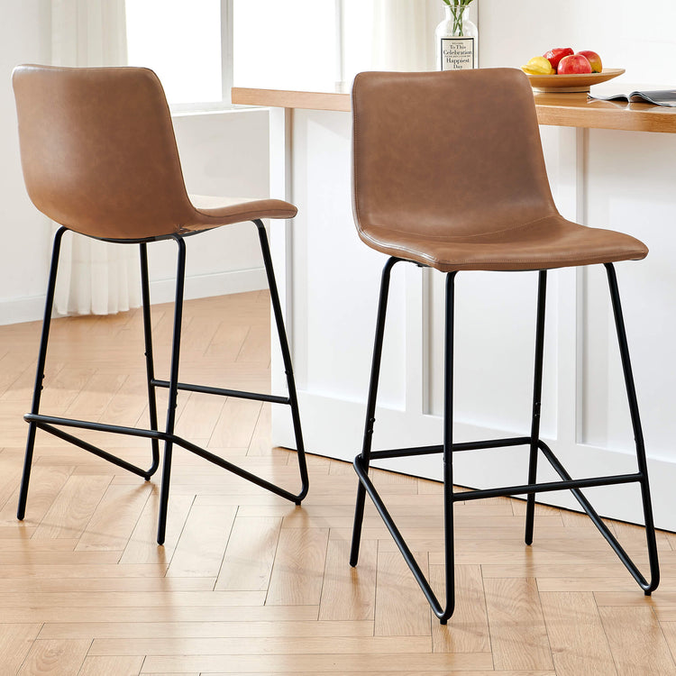 Shiloh counter stools in brown faux leather with black metal legs at a kitchen counter - CHITA Living