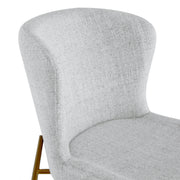 Golda Dining Chair backrest in soft grey fabric with sleek brass legs - CHITA Living
