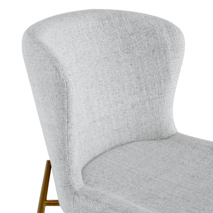 Golda Dining Chair backrest in soft grey fabric with sleek brass legs - CHITA Living