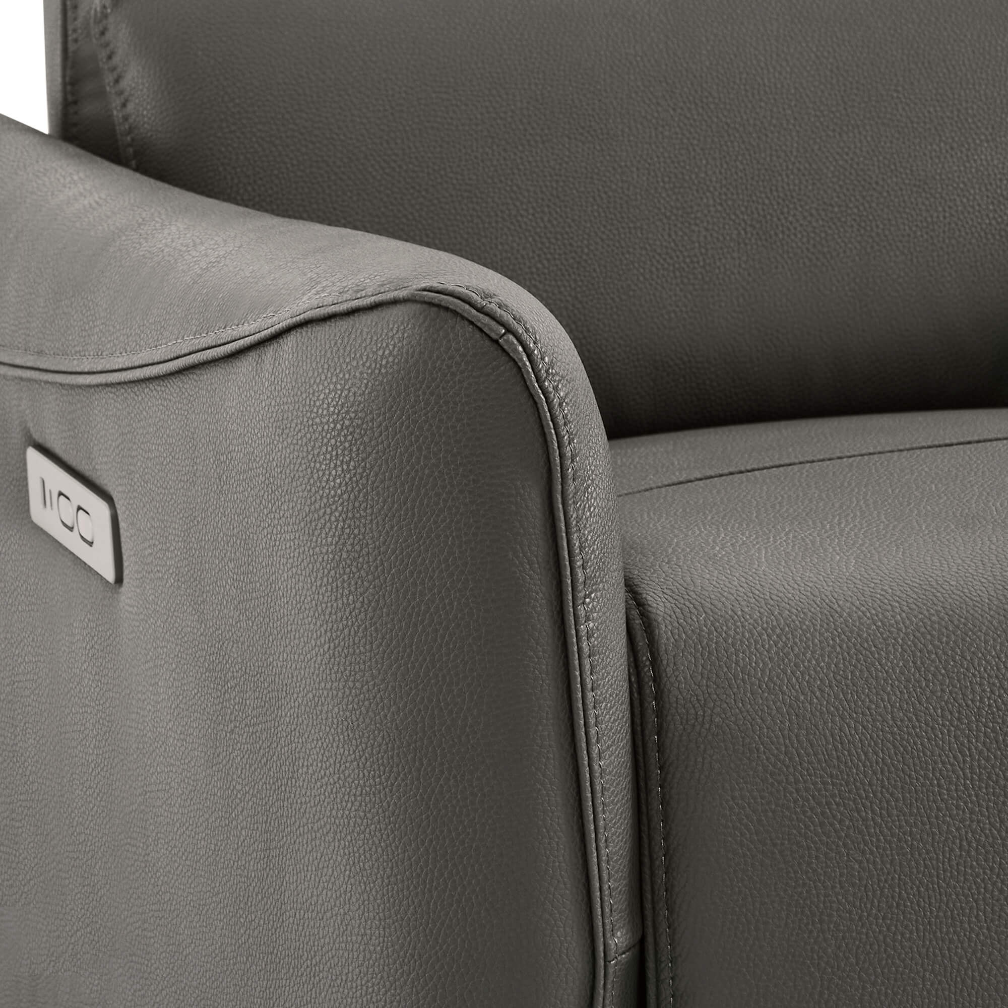 Close-up of modern gray power swivel recliner showing textured upholstery and armrest - CHITA Living