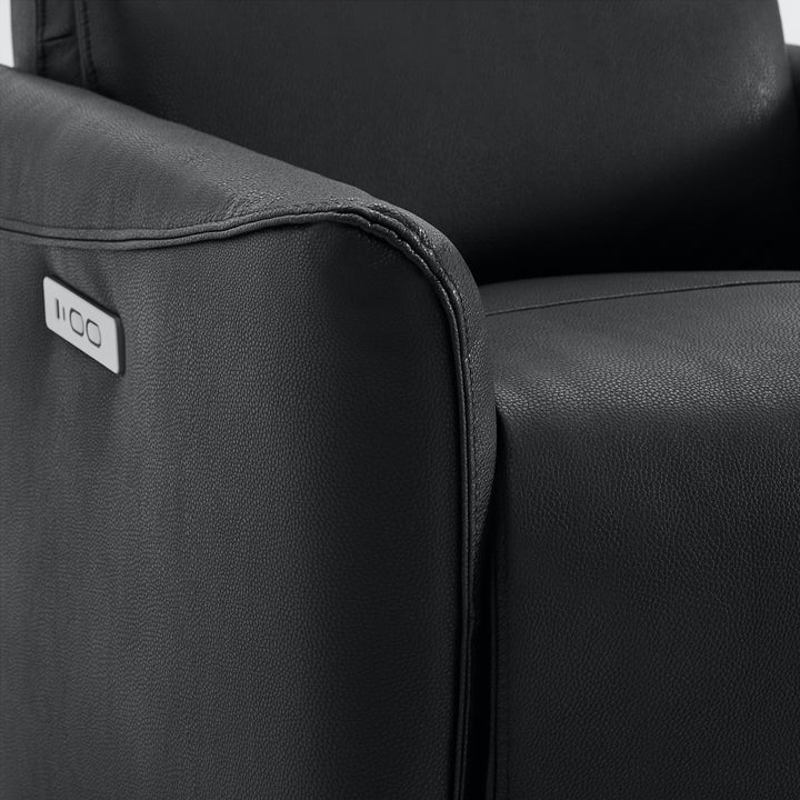 Close-up of black leather Tracee recliner with power button detail - CHITA Living