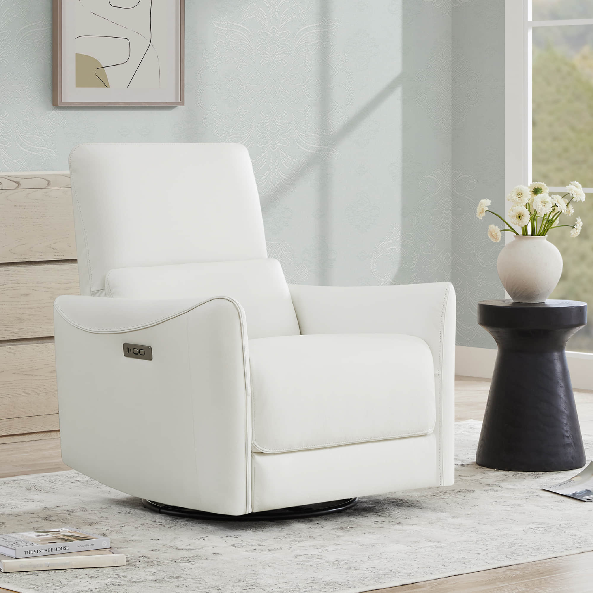 White power swivel nursery glider recliner in modern living room with stylish decor - CHITA Living