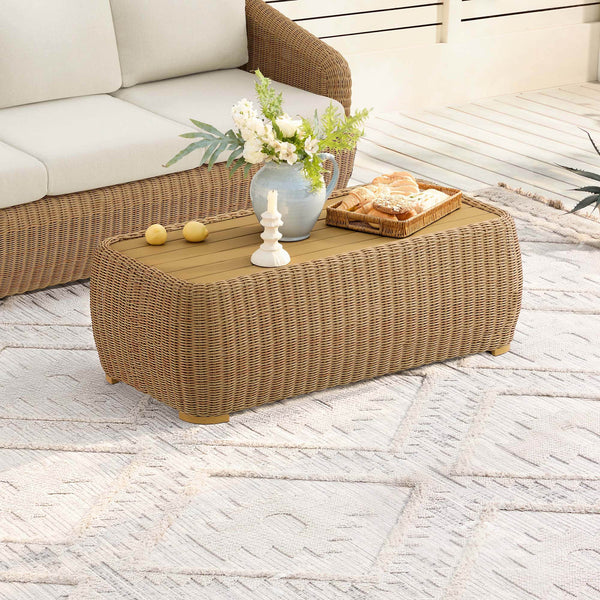 Liana Wicker Outdoor Coffee Table with handwoven resin wicker base and wood grain metal top.