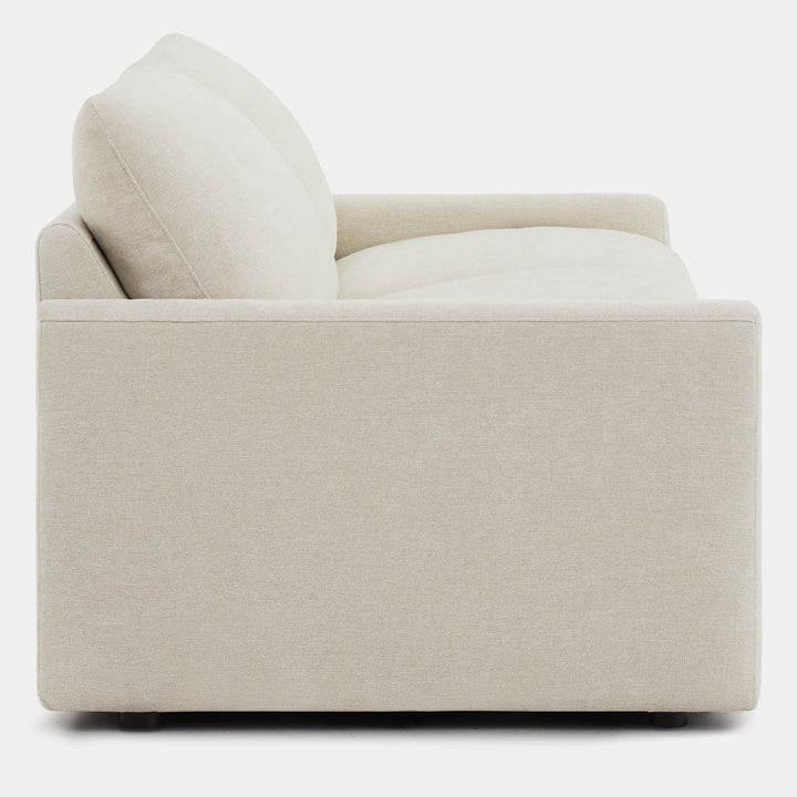 Side view of Ohana 2-Seat Motion Modular Sofa in soft beige fabric - CHITA Living