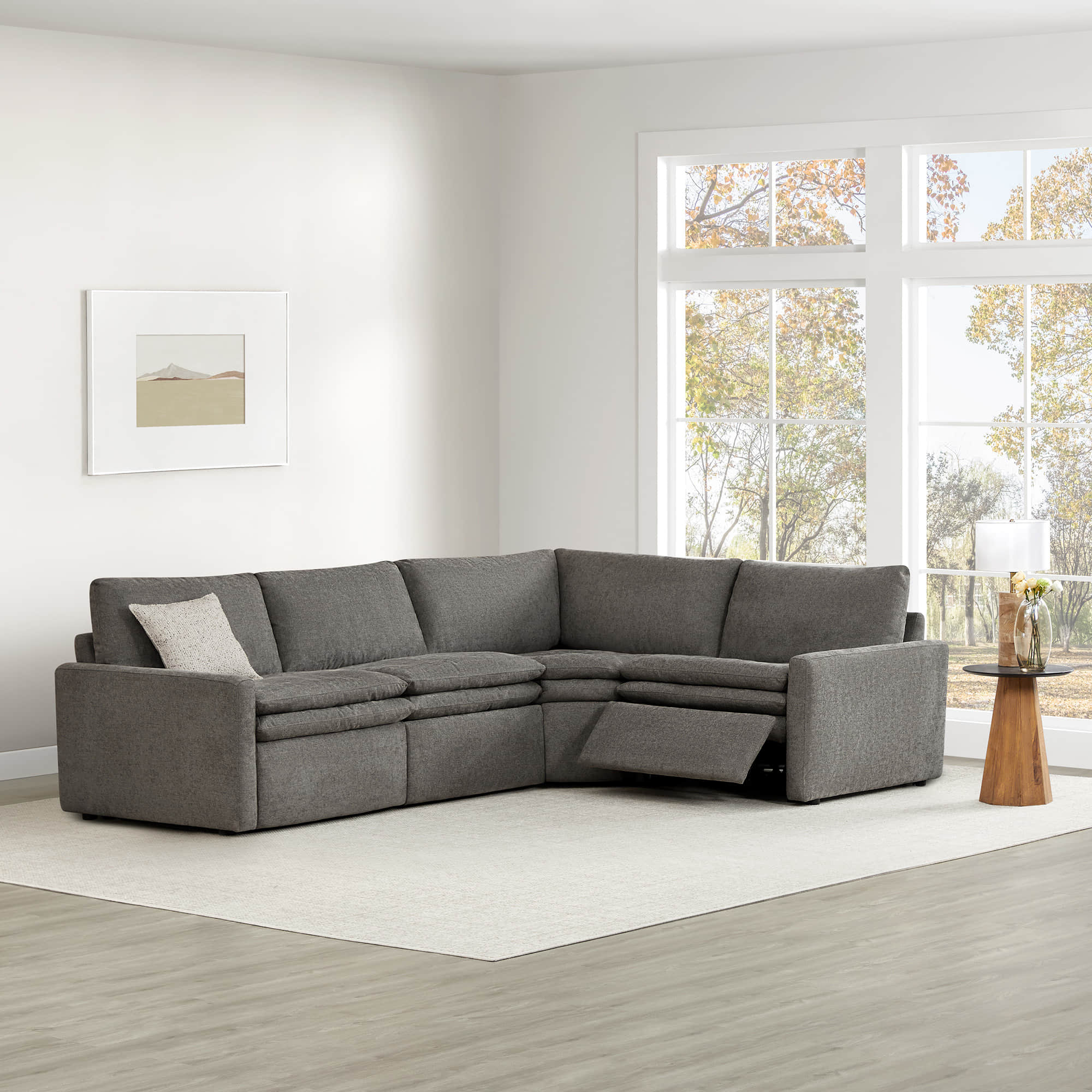 Grey Ohana modular sofa in modern living room with reclining seat and ample seating - CHITA Living