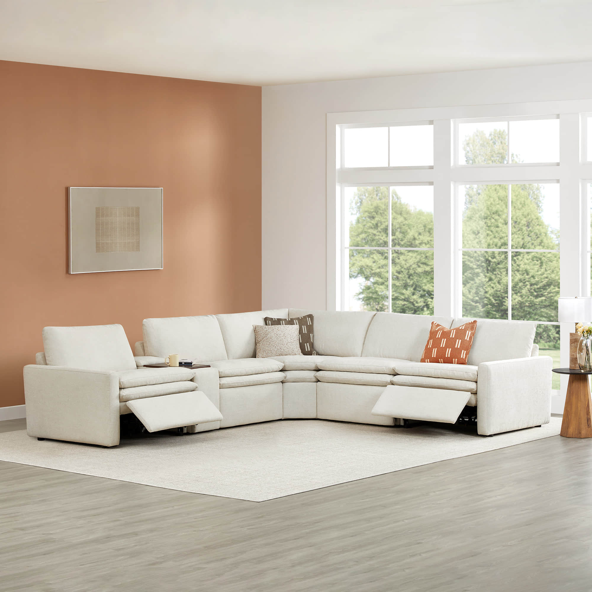 Ohana 5-seat modular sofa in soft beige reclined for comfort in a bright living room - CHITA Living