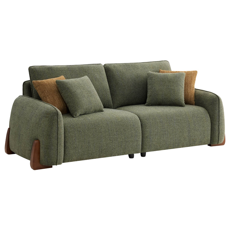 Green 2-seat modular curved sofa with wood legs and accent pillows.