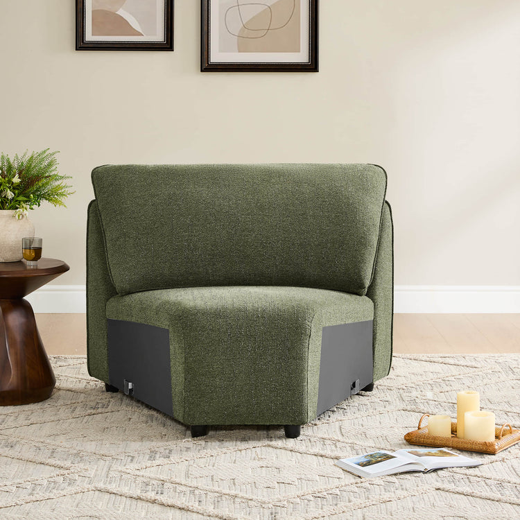 Forest green modular corner seat with dark wood legs and textured fabric.