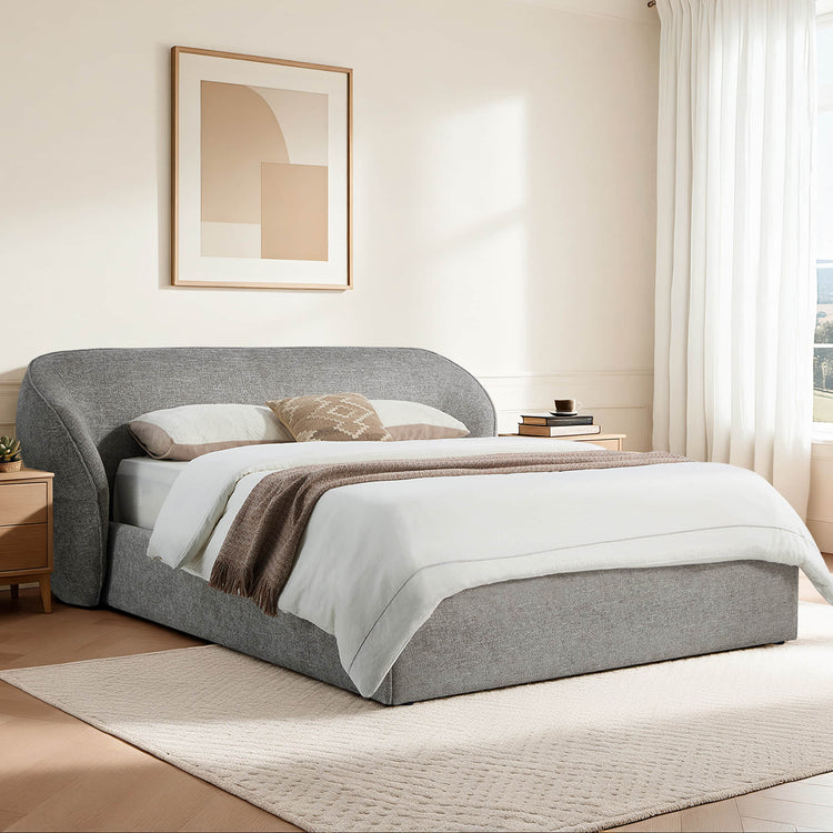 Zinnia modern grey curve platform bed with wingback headboard in a bedroom setting.