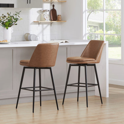 Eli swivel bar stools with brown faux leather seats and sleek black metal frames in a kitchen - CHITA Living