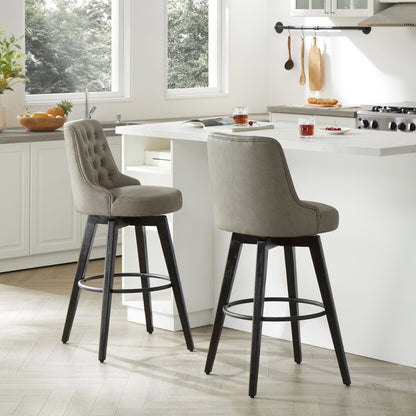 Gray tufted swivel bar stools with black legs in a modern kitchen - CHITA Living