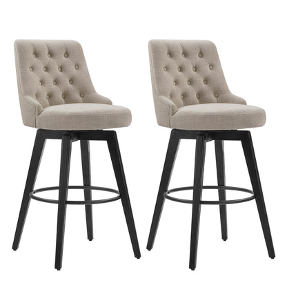 Beige tufted swivel bar stools with black legs in modern dining area - CHITA Living