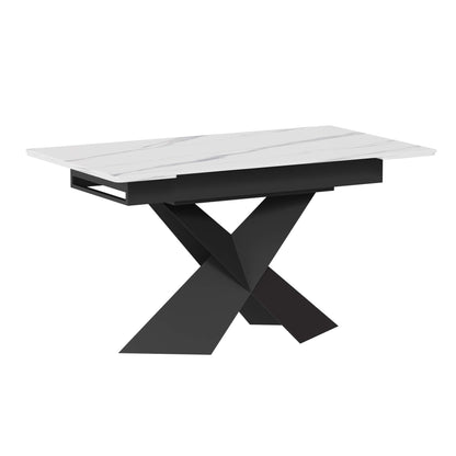 Extendable dining table with white sintered stone top and black X-shaped steel base