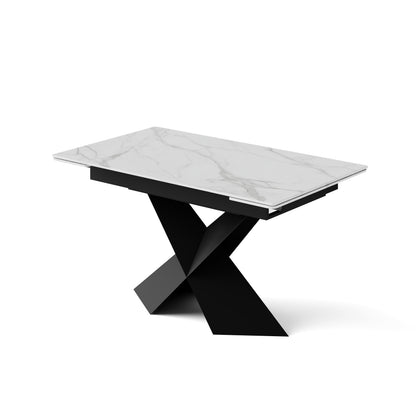 Extendable dining table with white sintered stone top and black X-shaped steel base