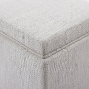 Close-up of textured white cube ottoman showcasing modern design and versatility - CHITA Living