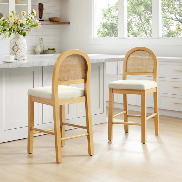 Abigail Rattan Curved Counter Stool with Performance Fabric features a woven backrest and cushioned seat in a modern kitchen setting.