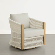 An outdoor bistro set chair with cream cushions and a woven design, featuring wooden accents.