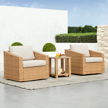 Calum Rattan Outdoor Bistro Set with beige cushions, ideal for modern patio spaces - CHITA Living