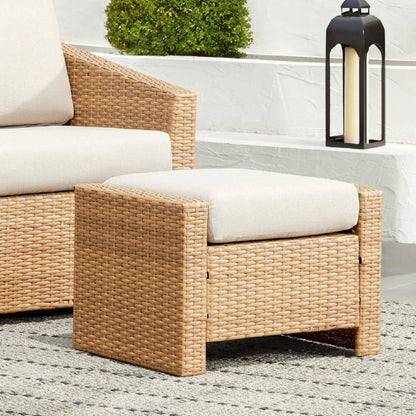 Calum Rattan outdoor ottoman with cream cushion for stylish patio relaxation - CHITA Living