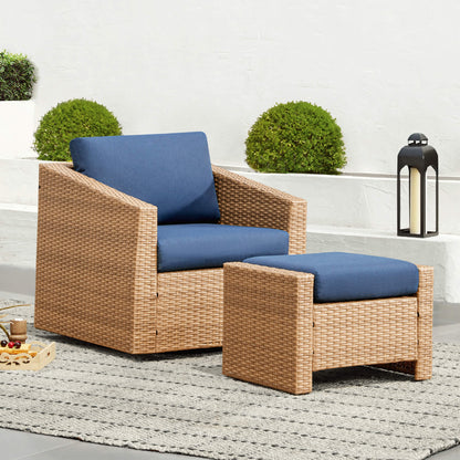 Calum Rattan outdoor chair with navy cushion and matching footrest for stylish relaxation - CHITA Living
