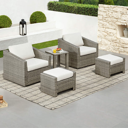 Calum Rattan 5-piece outdoor seating set featuring light cushions, side table, and footrests - CHITA Living